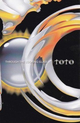 TOTO - THROUGH THE LOOKING GLASS (MC)
