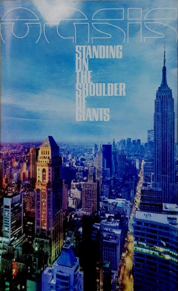 OASIS - STANDING ON THE SHOULDER OF GIANTS (MC)